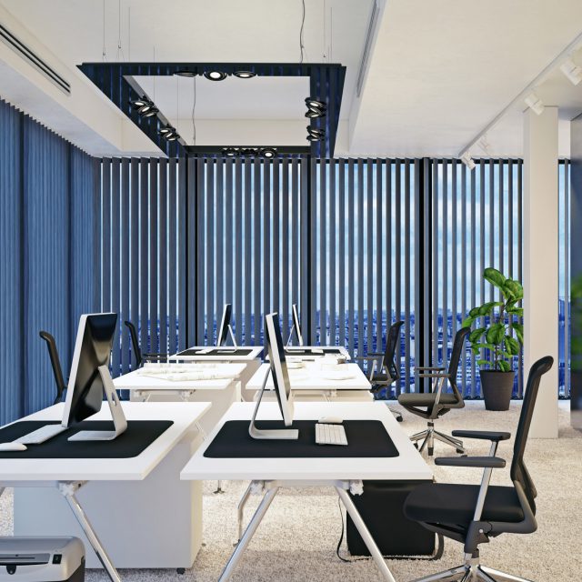 an office with vertical blinds